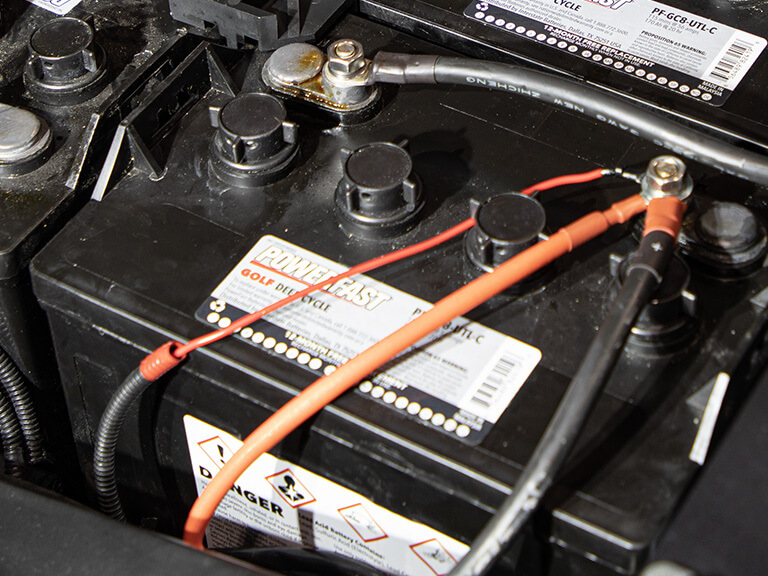 close up of golf cart battery